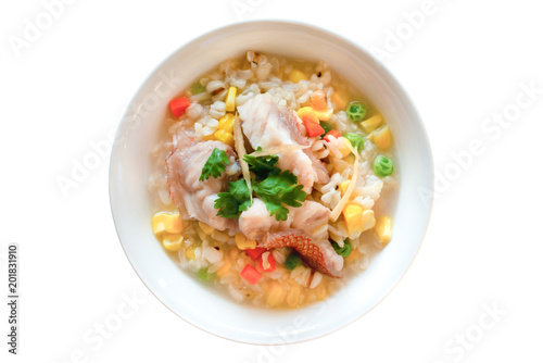 Fish and cereal porridge, top view.Fish in soft boiled cereal and rice for breakfast isolated on white background,healthy food concept .