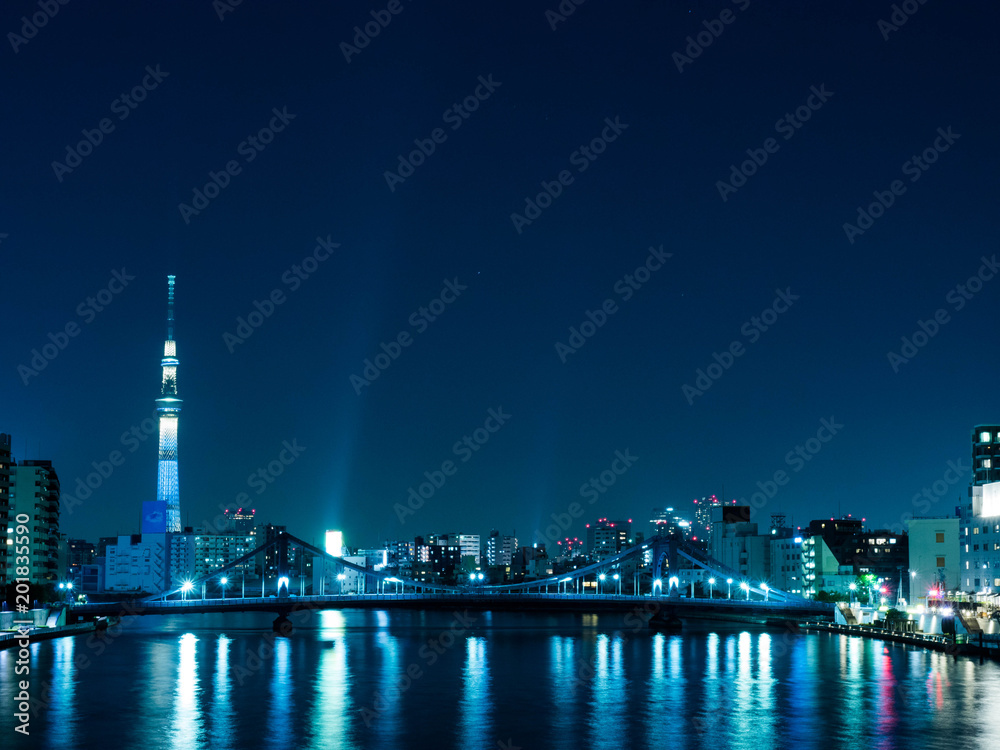 night view of Tokyo with river reflection