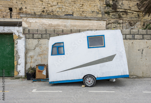 old caravan on street photo