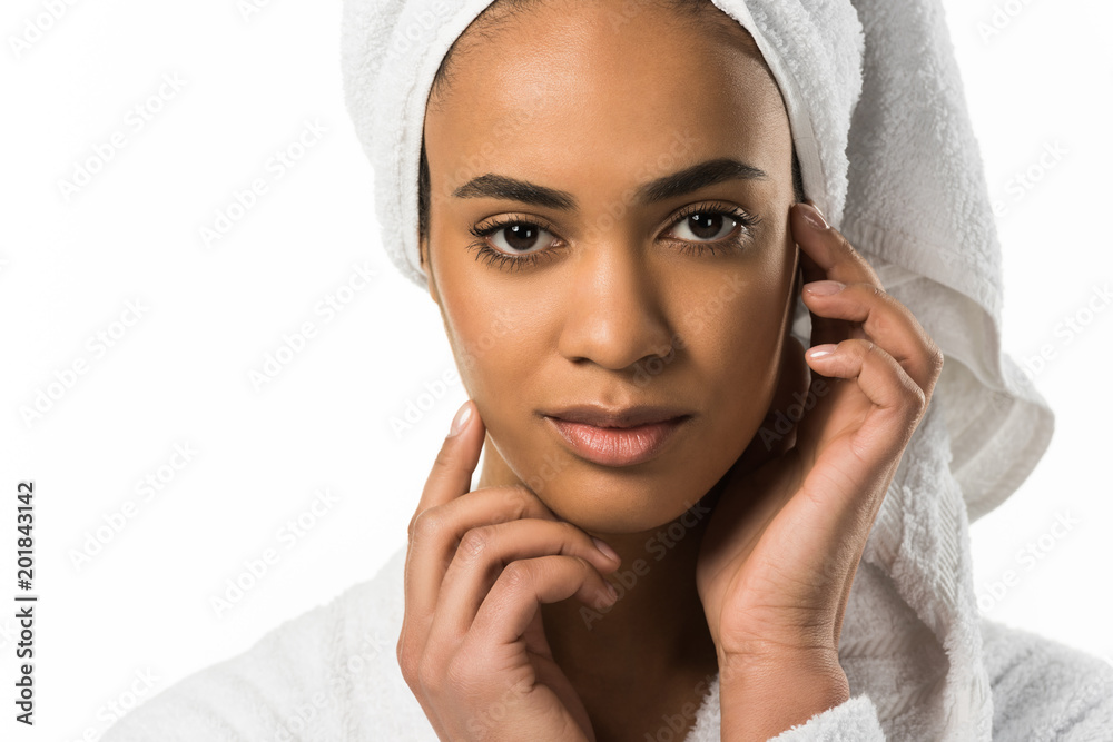 tender african american woman in bathrobe and towel with clean skin, isolated on white tender african american woman in bathrobe and towel with clean skin, isolated on white