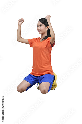 Happiness asian female soccer player celebrate