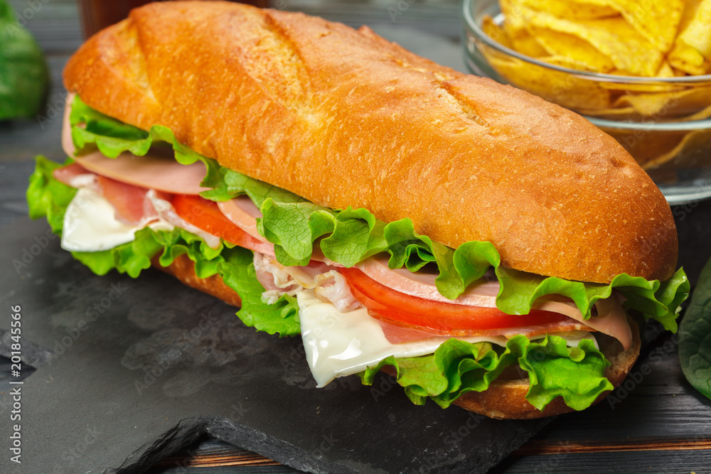 sandwich on a wooden table sandwich on a wooden table