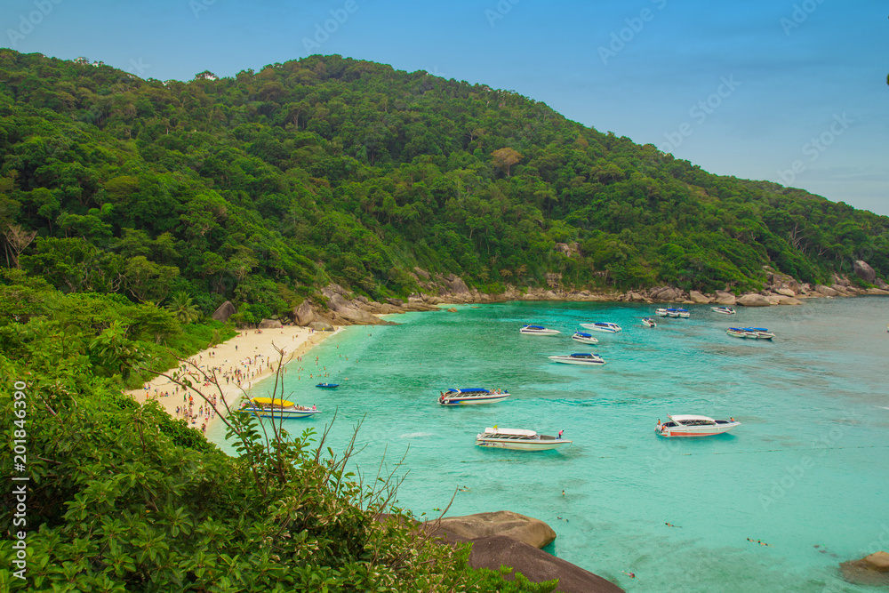Crystal clear shallow waters that harbor excite rock formations and spectacular coral reefs, beach, tourists, NATIONAL PARK, Similan islands, phuket. Fantastic lagoon, paradise in real life.