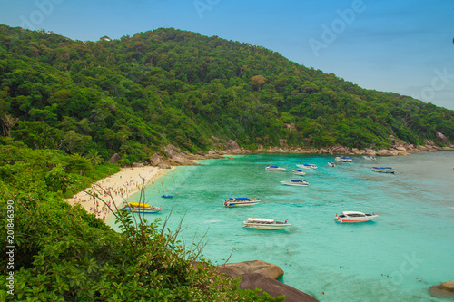 Crystal clear shallow waters that harbor excite rock formations and spectacular coral reefs, beach, tourists, NATIONAL PARK, Similan islands, phuket. Fantastic lagoon, paradise in real life.