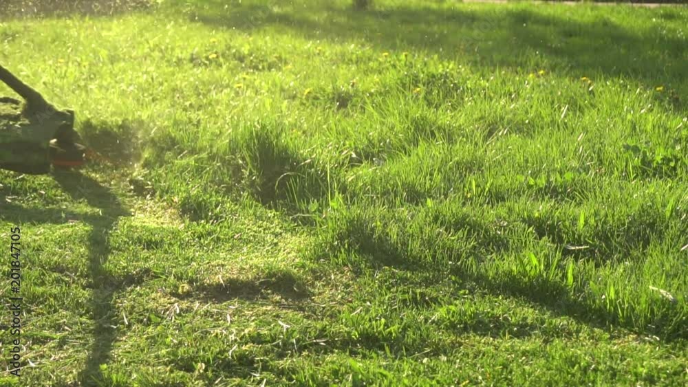 Gardener Mowing The Grass Slow Motion Gardener Mowing The Grass Slow Motion