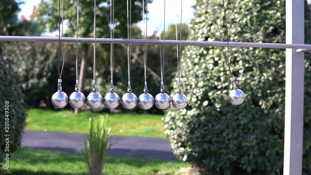 hitting each other metal balls Stock Video Adobe Stock