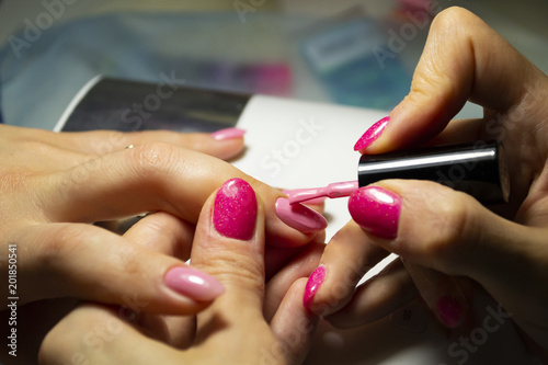 Manicure nail paint. Nail art closeup photo