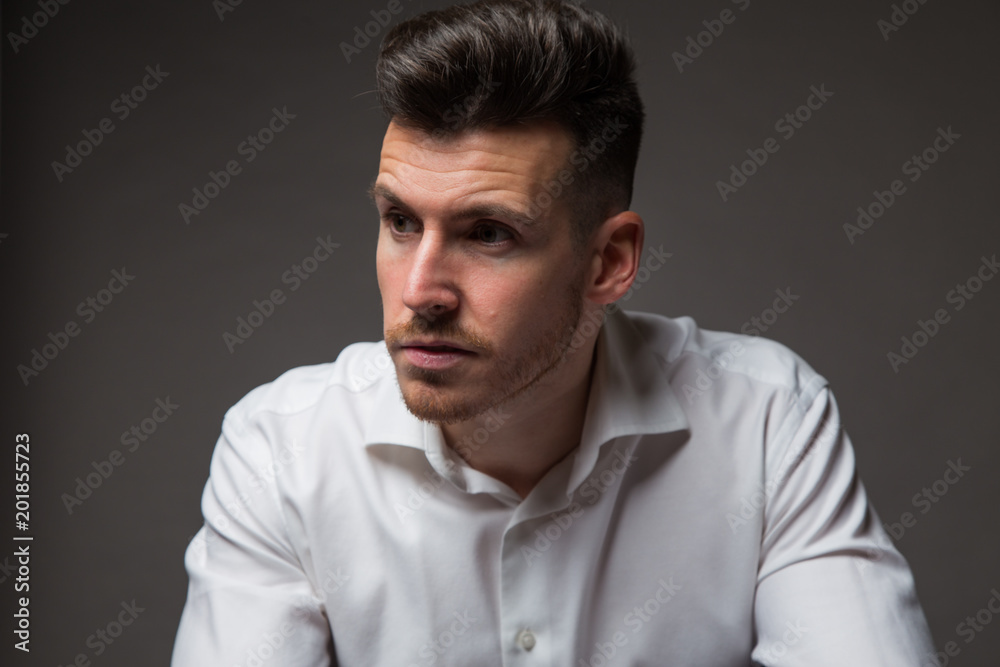 Relaxing man in suit on sofa Relaxing man in suit on sofa