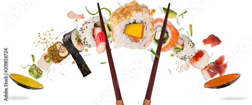 Obraz  z motywem Pieces of delicious japanese sushi frozen in the air.