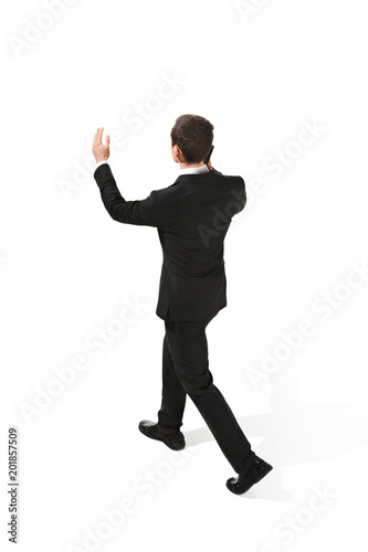 The back of businessman over white background © master1305