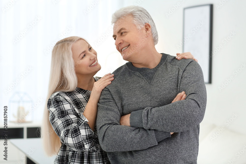 Portrait of adorable mature couple together indoors Portrait of adorable mature couple together indoors