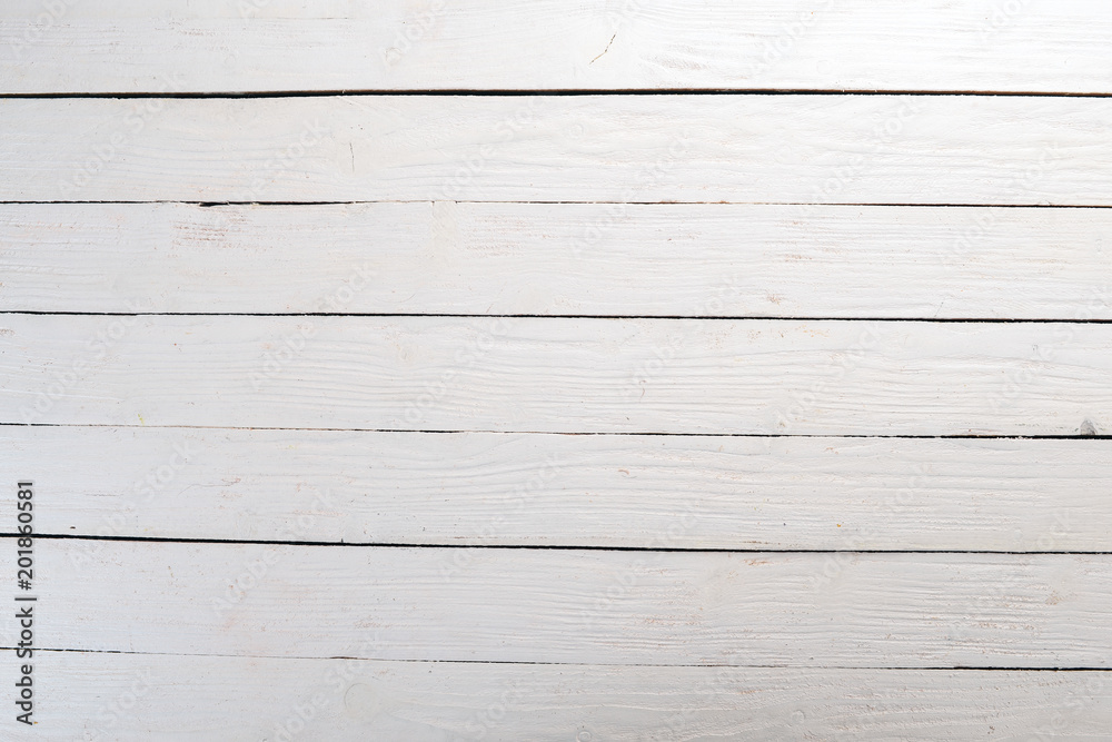 Obraz premium White textured wooden background.