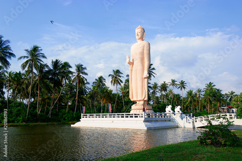 Big white Buddha in Hikkaduwa, Sri Lanka. The statue near Tsunami museum and Tsunami Memorial - a popular tourist place in Peraliya.