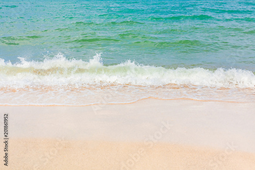 Wave and sand beach tropical sea.