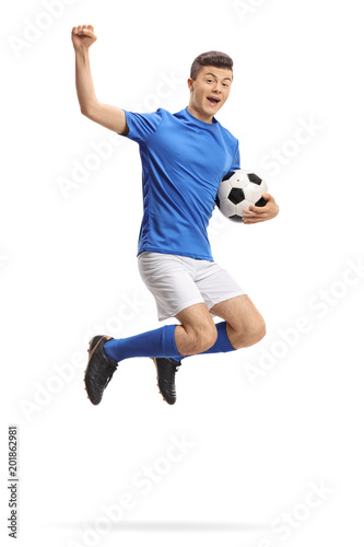 Overjoyed teenage soccer player jumping © Ljupco Smokovski