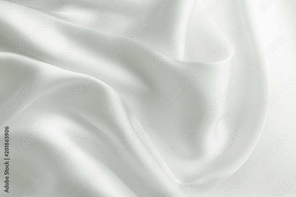 Elegant white satin silk with waves, abstract background