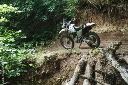 travel motorcycle off road, forest dirt, concept, active lifestyle, enduro