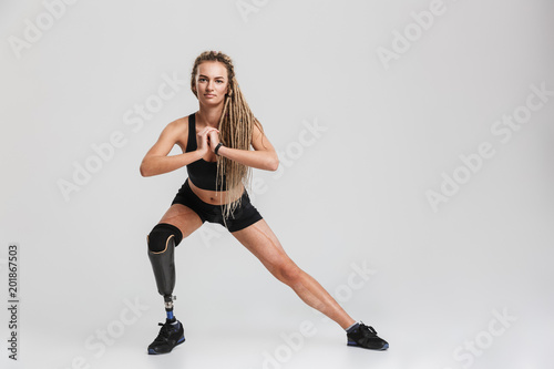 Strong healthy young disabled sportswoman