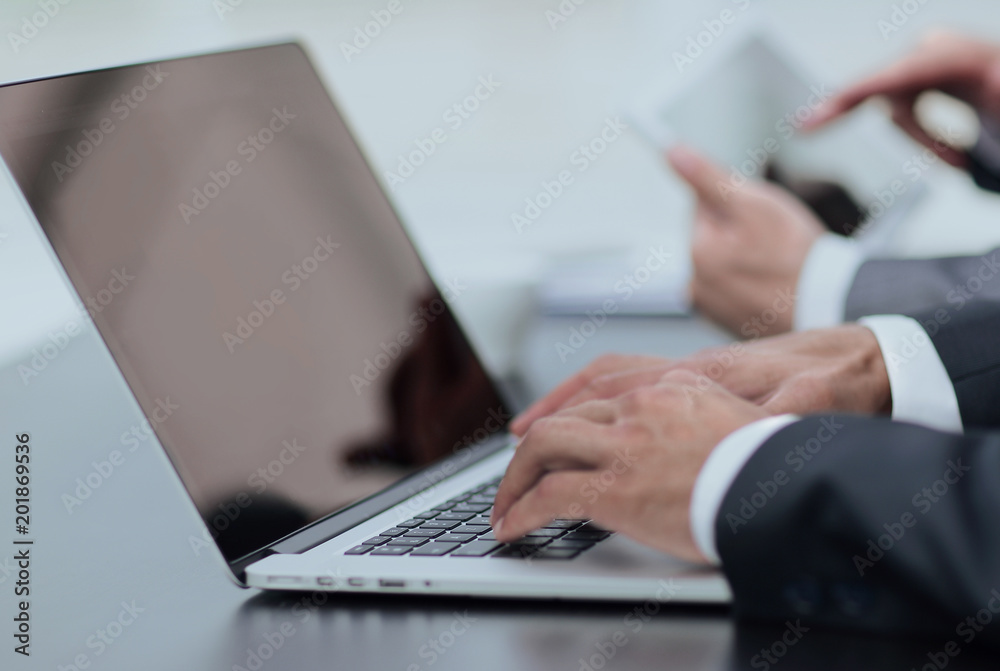 closeup.businessman working on laptop closeup.businessman working on laptop