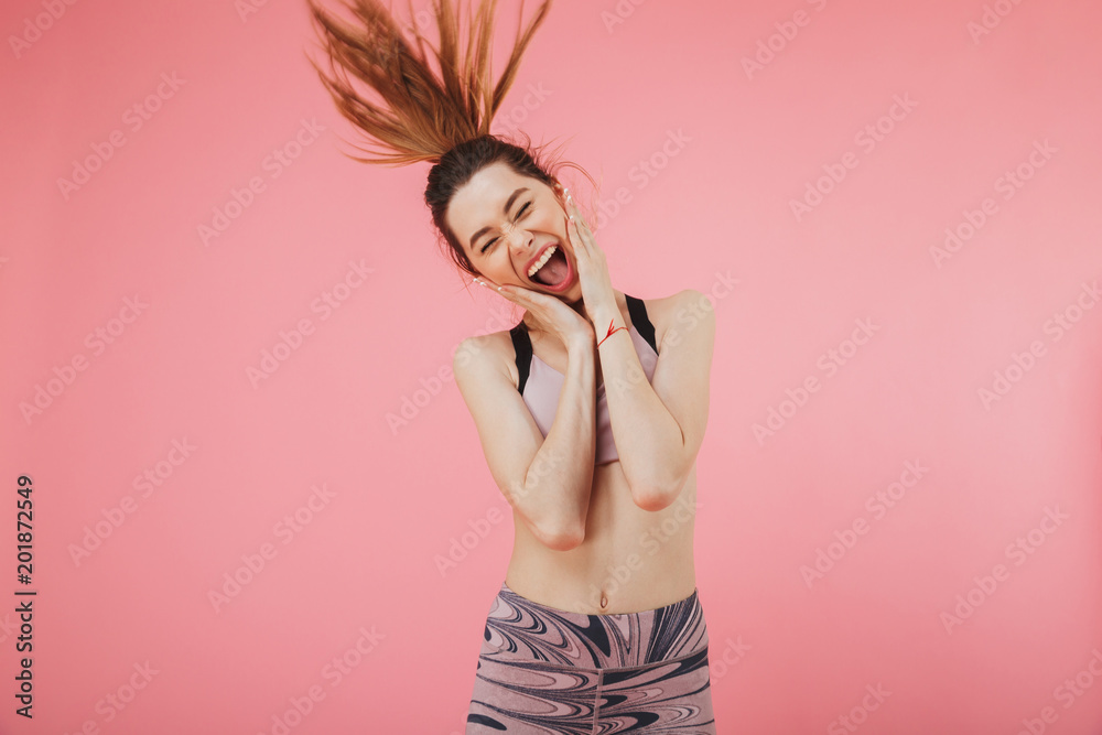 Excited emotional young fitness sports woman Excited emotional young fitness sports woman