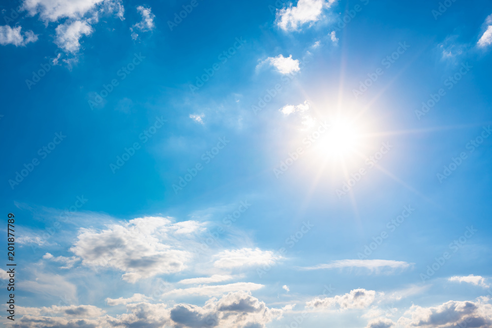 Obraz premium Summer background, blue sky with white clouds and sun