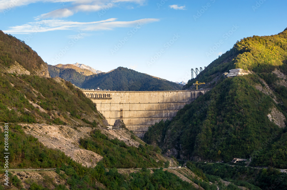 The Enguri hydroelectric power station HES. The Jvari Reservoir next to Inguri Dam, surrounded by mountains, Upper Svaneti, Georgia. Second highest concrete arch dam in the world. Jvari location.
