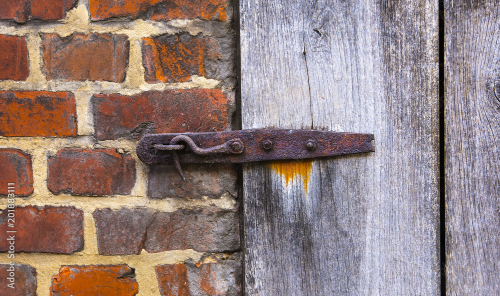 Stable door lock of an old farmhouse, North Rhine-Westphalia, Germany Stable door lock of an old farmhouse, North Rhine-Westphalia, Germany