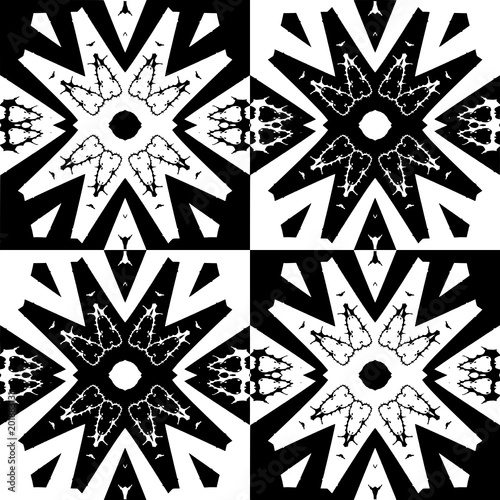 Abstract geometyric pattern with na four ornamental stars in a black and white colors photo