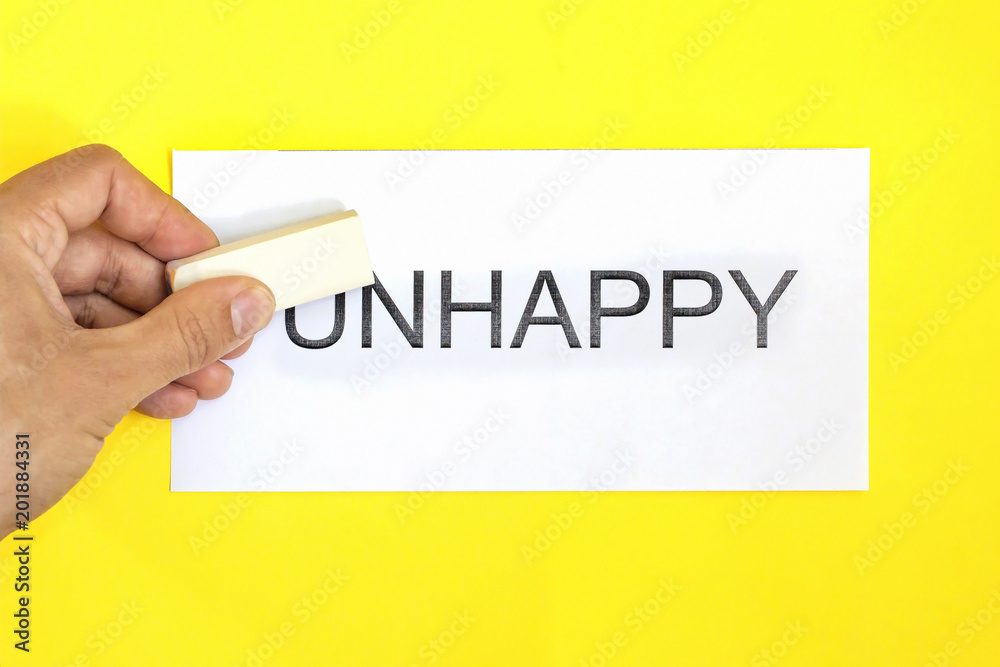 Eraser converts unhappy into happy. concept for self belief, positive attitude and motivation Eraser converts unhappy into happy. concept for self belief, positive attitude and motivation