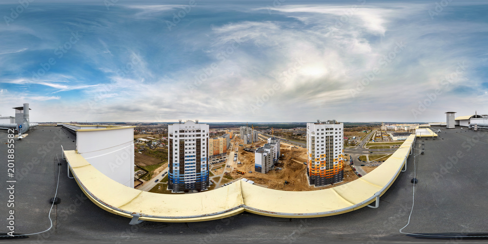 Aerial full seamless spherical panorama 360 angle degrees view from roof of multi-storey building with view of construction residential quarter in equirectangular projection. skybox VR AR content