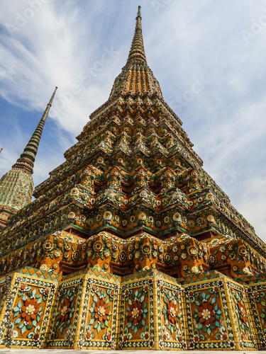 Large colorful stupa in the Phra Maha Chedi Si Ratchakan area of Wat Pho (Buddhist temple) in Bangkok, Thailand photo