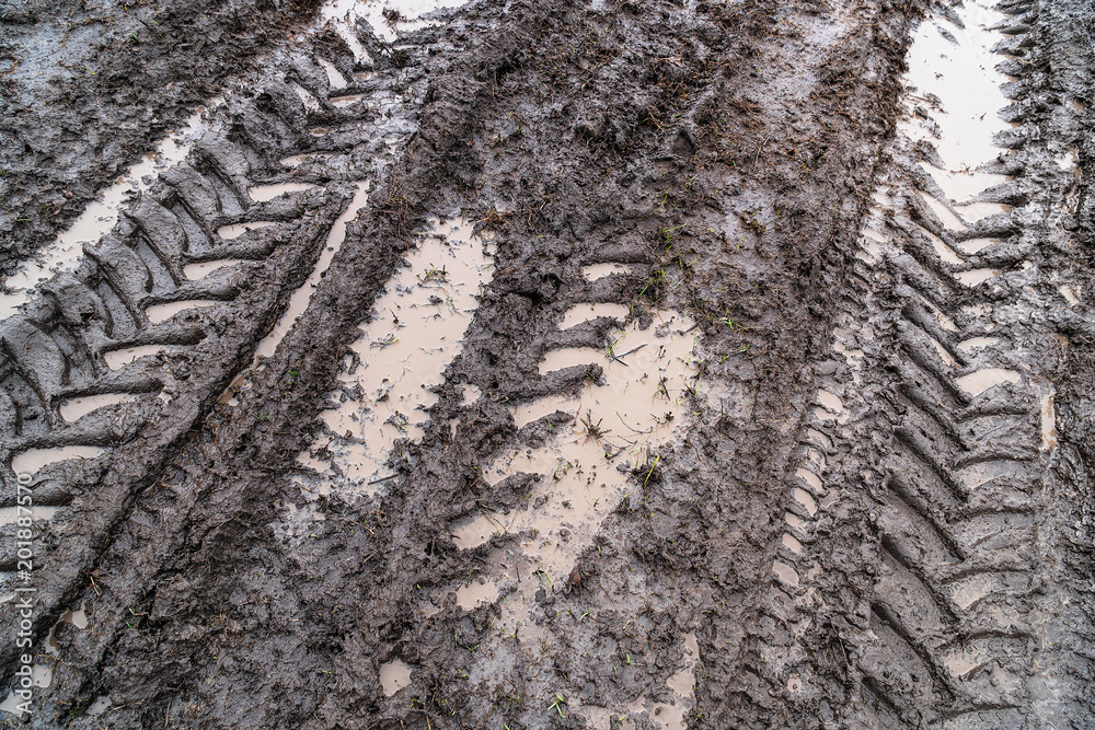 Imprint of an off-road vehicle tire on a dirty road Imprint of an off-road vehicle tire on a dirty road