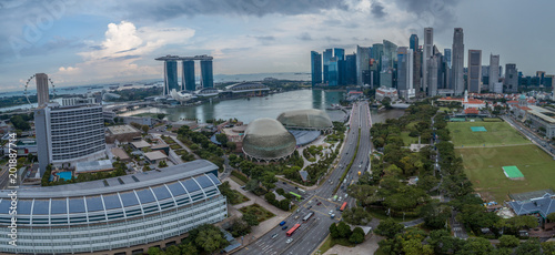 Photography Aerial view panorama of Singapore skyscrapers with city skyline during cloudy su