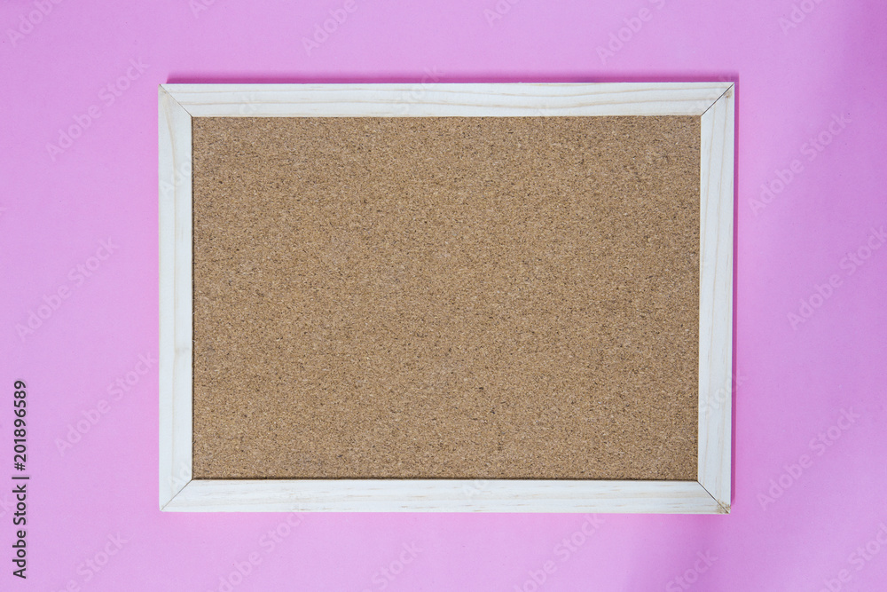 Fototapeta premium Isolate of wooden pin frame on pink background