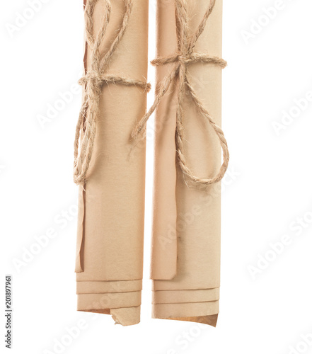 Vintage rolled up papers isolated on white