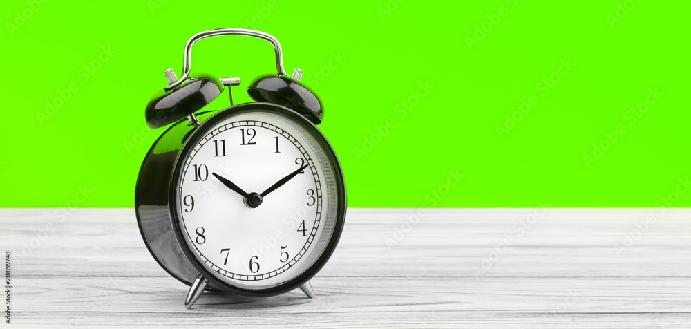 alarm clock on wooden board alarm clock on wooden board