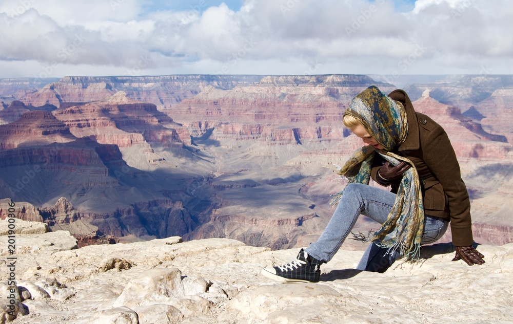 Happy Blonde Woman at Grand Canyon - Arizona, USA Happy Blonde Woman at Grand Canyon - Arizona, USA