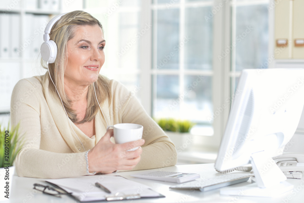 mature woman using computer mature woman using computer
