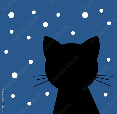 Black cat looking at the snow