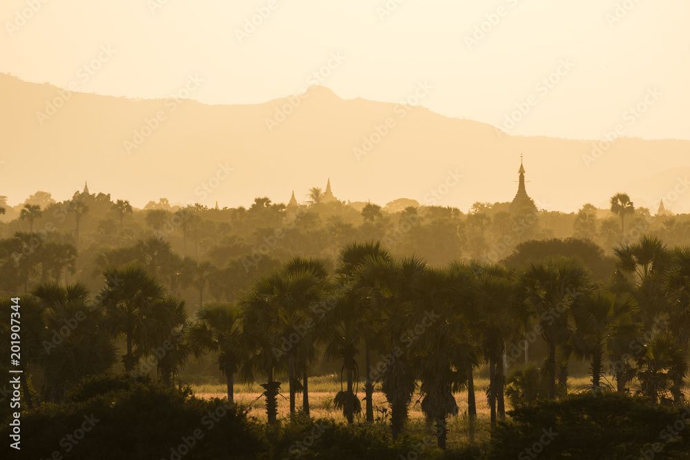 Landscape with temples and pagodas in the magic evening light in Bagan, Myanmar Landscape with temples and pagodas in the magic evening light in Bagan, Myanmar