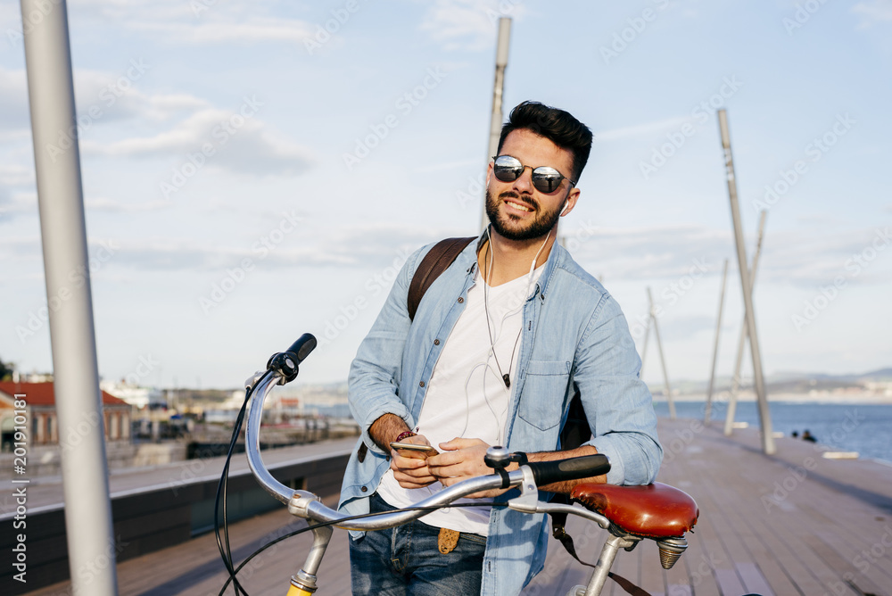 custom made wallpaper toronto digitalSmiling guy with bicycle and smartphone