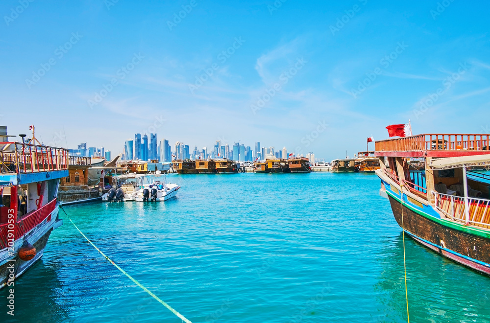 Old boats in Doha harbor, Qatar - obrazy, fototapety, plakaty 
