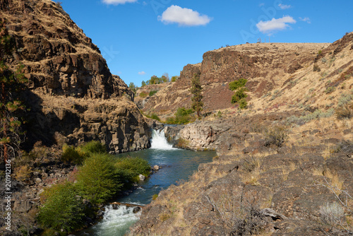 Waterfall at White River in canyon in Eastern Oregon USA Pacific Northwest. © thecolorpixels