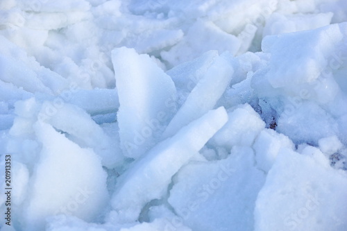 big white and blue pieces of ice and snow. debacle. ice background texture © Konstantin