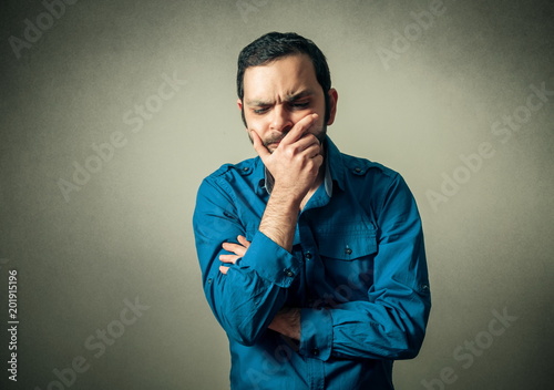 Portrait of the bearded man thinking