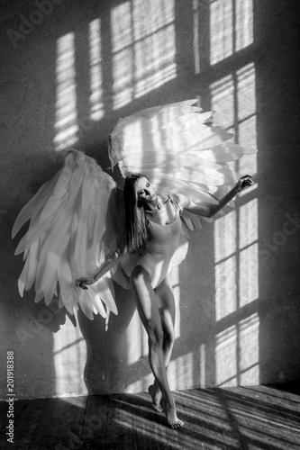 angel woman posing in studio