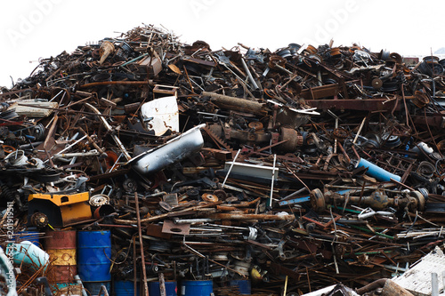 Scrap Metal Pile. old rusty baths, barrels, pipes on processing