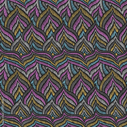 Ethnic pattern. Aztec fabric. Embroidery effect. Bird. Feather. Clothes or interior design. Boho fashion. Traditional homespun textile. Vector seamless pattern.