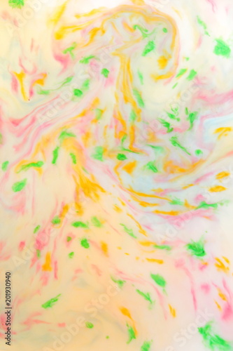 Multicolored abstract background  multicolored pattern of paints on liquid  blank for designer  paint divorces in milk  bright texture on white background  minimalism  creative blank for wallpaper