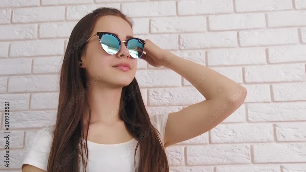 Girl in sunglasses. Beautiful teenager wearing sunglasses. Girl in sunglasses. Beautiful teenager wearing sunglasses.